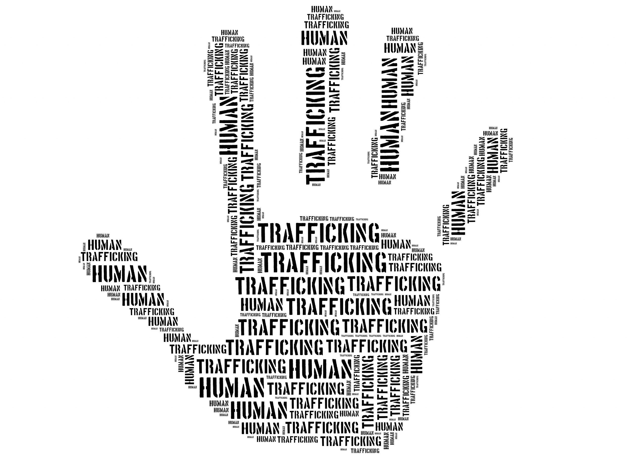 Human hand showing human trafficking phrase, highlighting the role Life Backup Plan can have in preventing human and sex trafficking