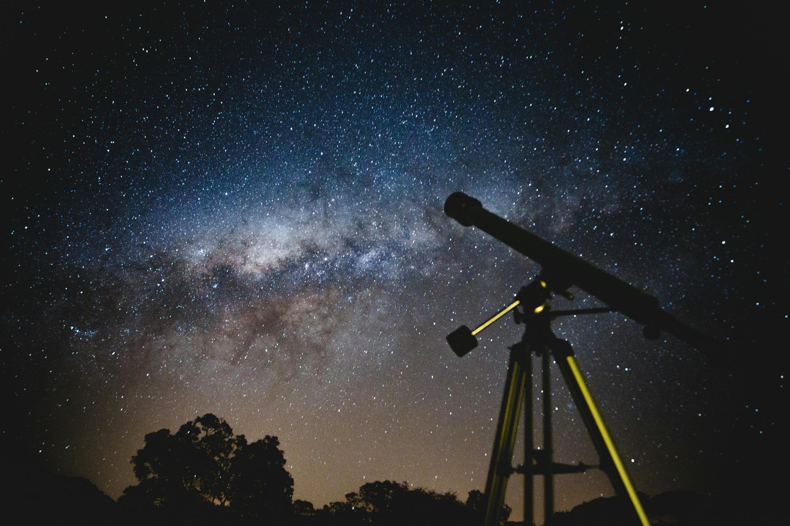 Astronomers and stargazers using the Life Backup Plan app for safety while enjoying the night sky, with emergency check-ins and peace of mind in remote locations.