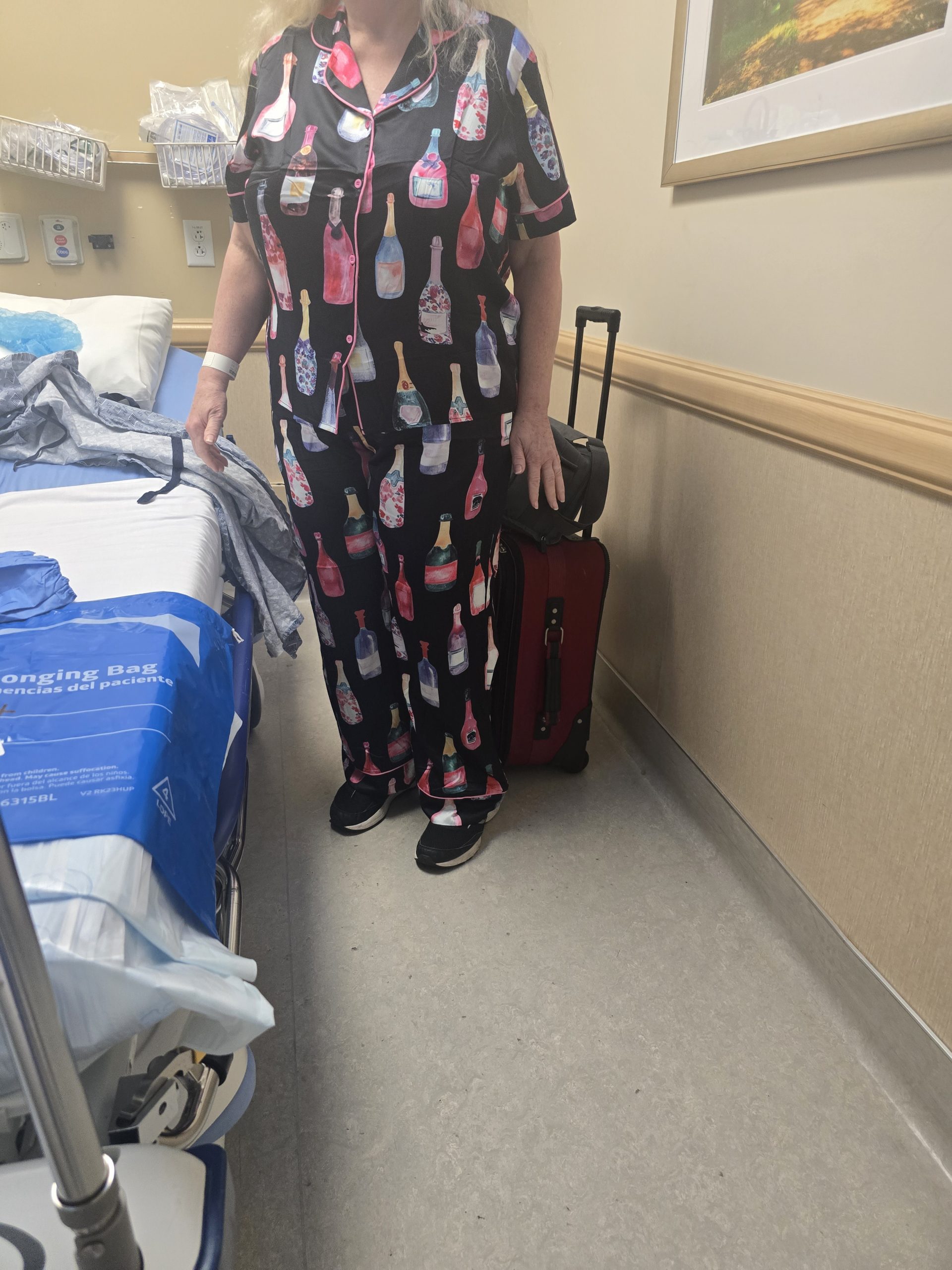Champagne thened button front pajamas to accommodate the cervical hard collar for the C7 - T1 anterior and posterior discectomy and fusion I am about to have