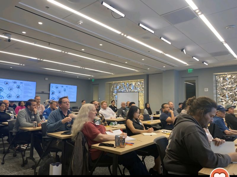 Sandy Eulitt, CEO and Founder of Life Backup Plan, is shown fully committed to increasing her cybersecurity knowledge, since she is wearing her cervical spine hard collar at the Cloud Security Alliance (CSA) Orange County February, 2026 meeting