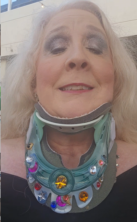 Sandy Eulitt, Founder and CEO of LIfe Backup Plan, showcasing her bedazzled cervical spine hard collar at the Orange County Coundil on Aging Gala